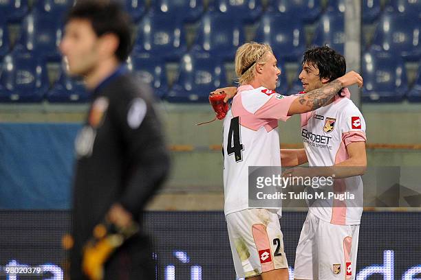 Javier Pastore celebrates his goal with his team-mate Simon Kjaer as Marco Amelia goalkeeper of Genoa lokks on during the Serie A match between Genoa...