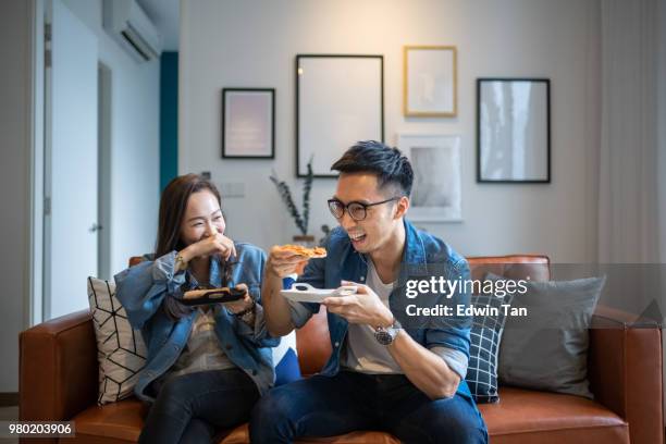 4 friends gathering at home for a quick meal - 4 pizzas stock pictures, royalty-free photos & images