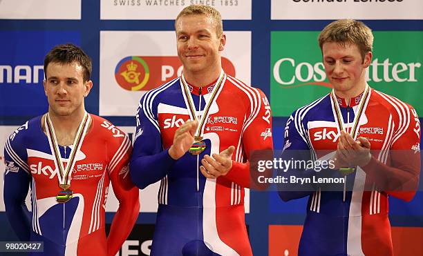 The Great Britain Team of Ross Edgar, Sir Chris Hoy and Jason Kenny stand on the podium after taking the bronze medal in the Men's Team Sprint on Day...