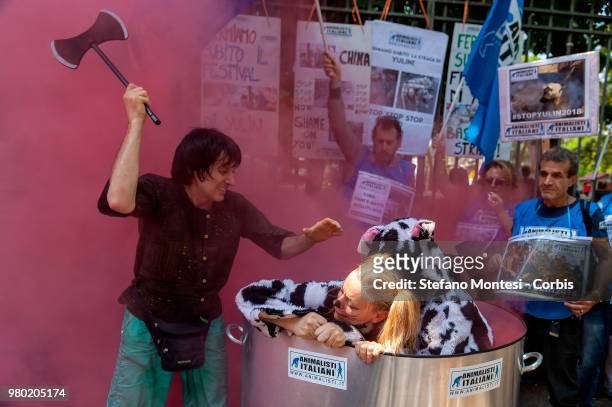 Animal rights activists demonstrate near the Embassy of China to protest against the Festival of Yulin on June 21, 2018 in Rome, Italy. Yulin is a...