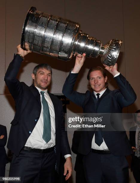 Alex Ovechkin and Nicklas Backstrom of the Washington Capitals hold the Stanley Cup as they arrive at the 2018 NHL Awards presented by Hulu at the...