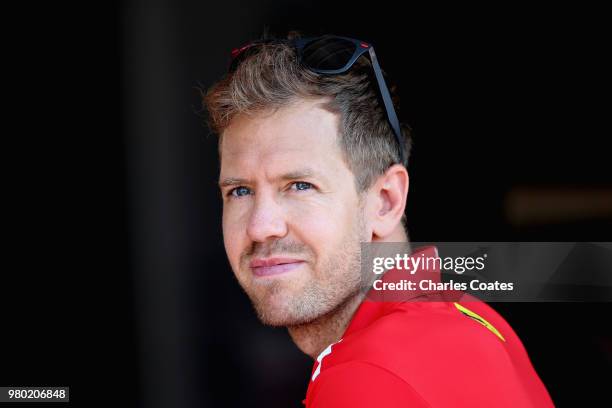 Sebastian Vettel of Germany and Ferrari looks on in the Paddock during previews ahead of the Formula One Grand Prix of France at Circuit Paul Ricard...