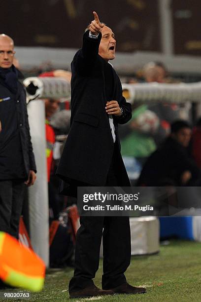 Delio Rossi coach of Palermo issues instructions during the Serie A match between Genoa CFC and US Citta di Palermo at Stadio Luigi Ferraris on March...