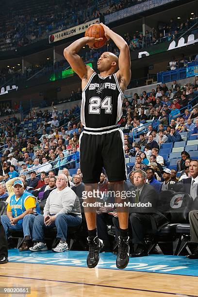 Richard Hamilton of the San Antonio Spurs shoots against the New Orleans Hornets during the game on March 1, 2010 at the New Orleans Arena in New...