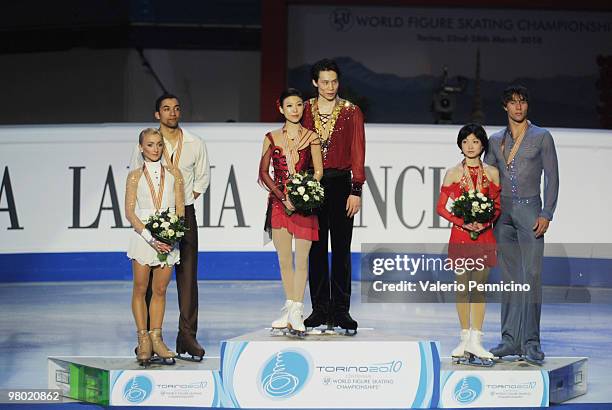The Silver medalist Aliona Savchenko and Robin Szolkowy of Germany, the Gold medalist Qing Pang and Jian Tong of China and the Bronze medalist Yuko...