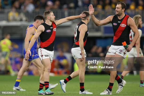 Devon Smith of the Bombers celebrates a goal during the round 14 AFL match between the West Coast Eagles and the Essendon Bombers at Optus Stadium on...