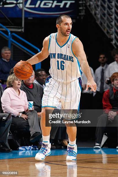 Peja Stojakovich of the New Orleans Hornets handles the ball against the San Antonio Spurs during the game on March 1, 2010 at the New Orleans Arena...