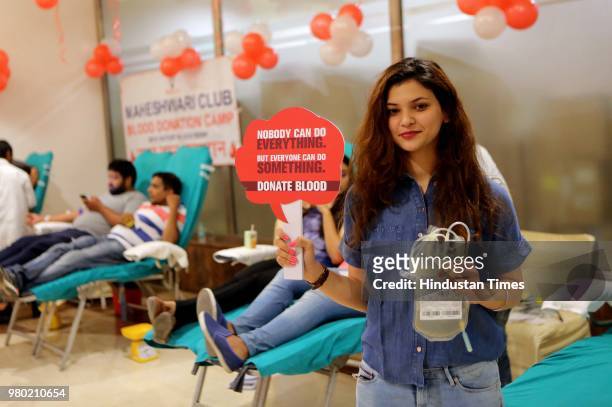 Girl campaigns during a blood donation camp organised by Aarone Group along with Select Citywalk, one of the most popular shopping malls in Delhi, in...