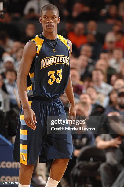 Jimmy Butler of the Marquette Golden Eagles looks on during the Big East Quarterfinal College Basketball Championship game against the Villanova...