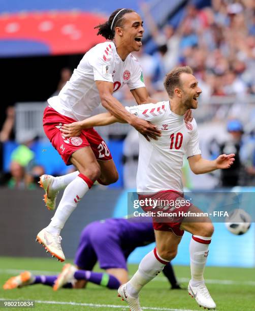 Christian Eriksen of Denmark celebrates with Yussuf Yurary Poulsen of Denmark after scoring the opening goal during the 2018 FIFA World Cup Russia...