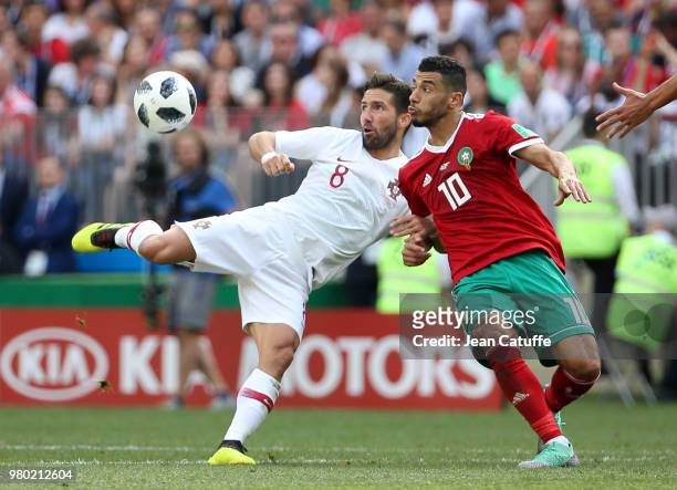 Joao Moutinho of Portugal, Younes Belhanda of Morocco during the 2018 FIFA World Cup Russia group B match between Portugal and Morocco at Luzhniki...