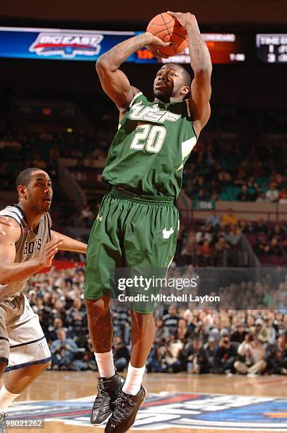 Dominique Jones of the South Florida Bulls takes a jump shot during the Big East Second Round College Basketball Championship game against the...