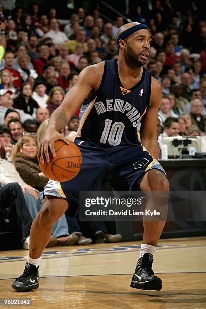 Jamaal Tinsley of the Memphis Grizzlies moves the ball during the game against the Cleveland Cavaliers on February 2, 2010 at Quicken Loans Arena in...