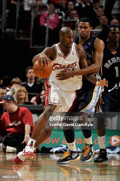 Jawad Williams of the Cleveland Cavaliers drives past Rudy Gay of the Memphis Grizzlies during the game on February 2, 2010 at Quicken Loans Arena in...