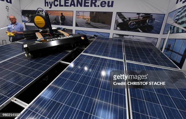 The so called "hyCleaner" cleaning system for solar energy panels is presented at the booth of a German company at the InterSolar trade fair in...