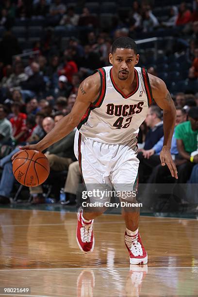 Charlie Bell of the Milwaukee Bucks moves the ball against the Houston Rockets during the game on February 17, 2010 at the Bradley Center in...