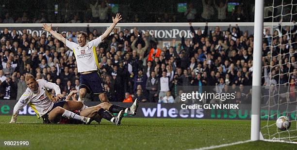 Tottenham Hotspur's Icelandic striker Eidur Gudjohnsen scores the third goal during their FA Cup sixth round replay football match against Fulham at...