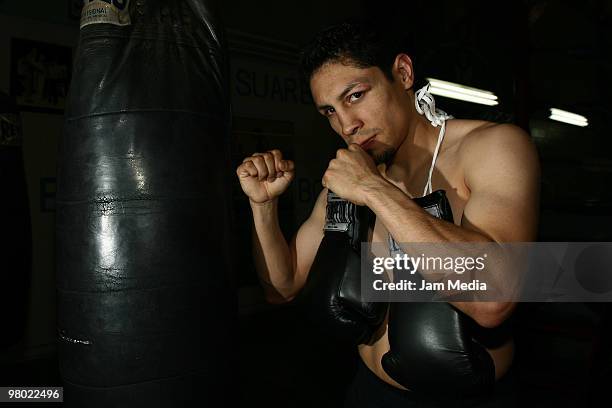 Mexican boxer Israel Vasquez, two-times junior featherweight world champion, poses for a photo after his workout session at Pino Suarez Gym on March...