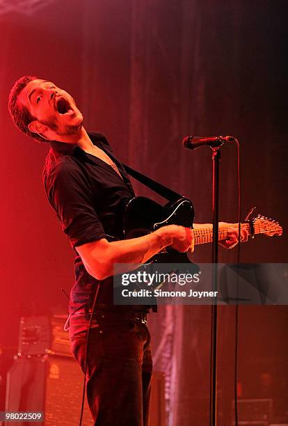 Tom Smith of Editors performs live on stage at Brixton Academy on March 24, 2010 in London, England.