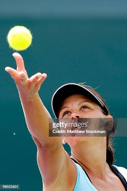Casey Dellacqua of Australia serves against Ekaterina Makarova of Russia during day two of the 2010 Sony Ericsson Open at Crandon Park Tennis Center...