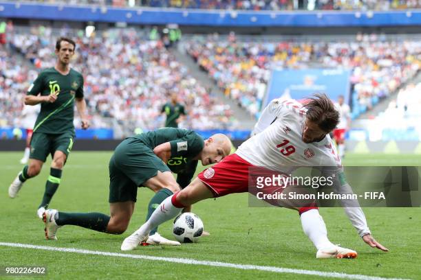 Aaron Mooy of Australia is tackled by Lasse Schone of Denmark during the 2018 FIFA World Cup Russia group C match between Denmark and Australia at...