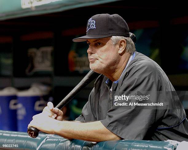 Tampa Bay Devil Rays manager Lou Piniella grabs a bat in the dugout bat during play against the Florida Marlins June 26, 2004. The Rays won 6 to 4.
