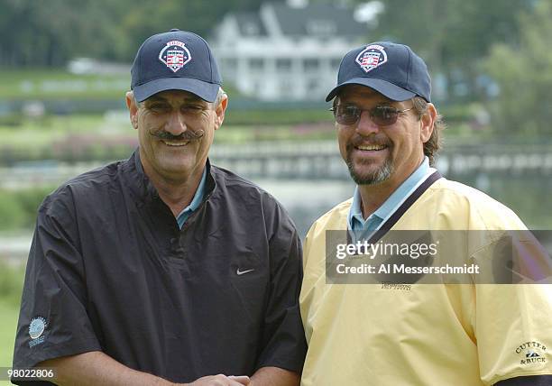 Rollie Fingers and Carlton Fisk play in golf tournament before 2004 Baseball Hall of Fame induction ceremonies July 25, 2004 in Cooperstown, New York.