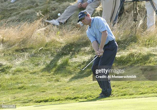 Justin Leonard chips into the 15th green during the final round at Whistling Straits, site of the 86th PGA Championship in Haven, Wisconsin August...