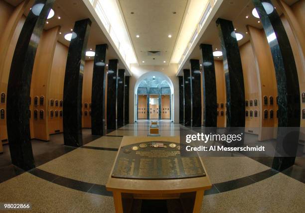 Plaques in the main hallway identify inductee classes in the Baseball Hall of Fame and Museum July 25, 2004 in Cooperstown, New York.