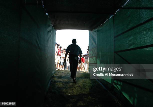Justin Leonard leaves the tunnel behind the 17th green during the final round at Whistling Straits, site of the 86th PGA Championship in Haven,...