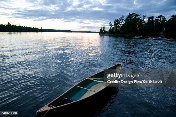 canoe, lake of the woods, ontario, canada - lake of the woods stock pictures, royalty-free photos & images