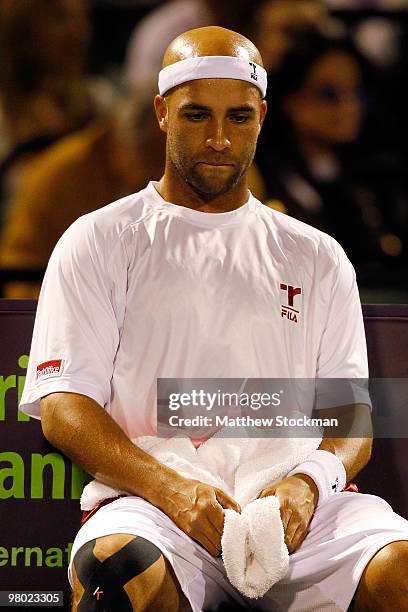 James Blake of the United States looks on against Filip Krajinovic of Serbia during day two of the 2010 Sony Ericsson Open at Crandon Park Tennis...