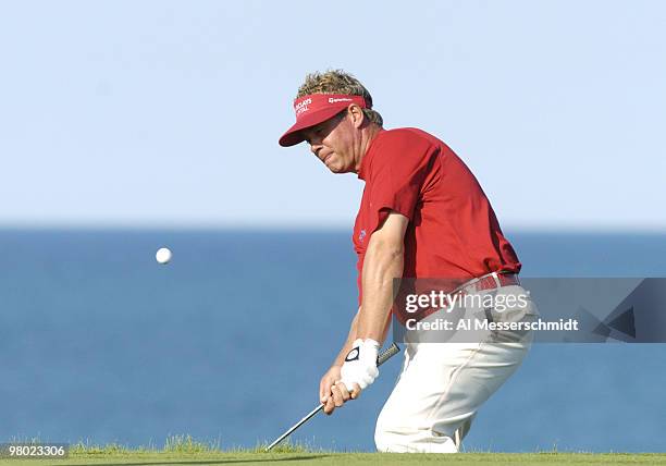 Darren Clarke chips into the 17th green during the final round at Whistling Straits, site of the 86th PGA Championship in Haven, Wisconsin August 15,...