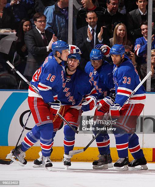 Marian Gaborik, Marc Staal, Brandon Dubinsky, and Michal Rozsival of the New York Rangers celebrate their second goal in the first period against the...