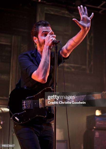 Tom Smith of Editors performs at the Brixton Academy on March 24, 2010 in London, England.