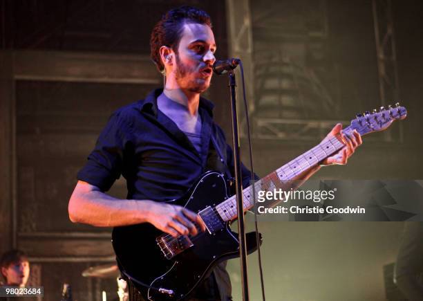 Tom Smith of Editors performs at the Brixton Academy on March 24, 2010 in London, England.