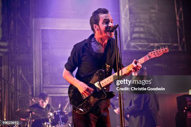 Tom Smith of Editors performs at the Brixton Academy on March 24, 2010 in London, England.