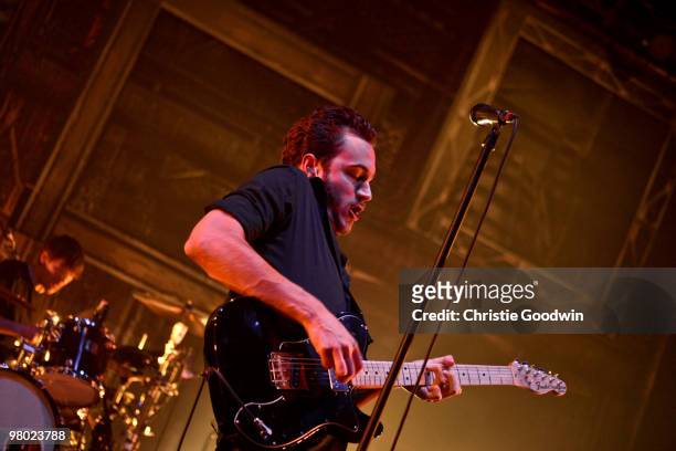 Tom Smith of Editors performs at the Brixton Academy on March 24, 2010 in London, England.