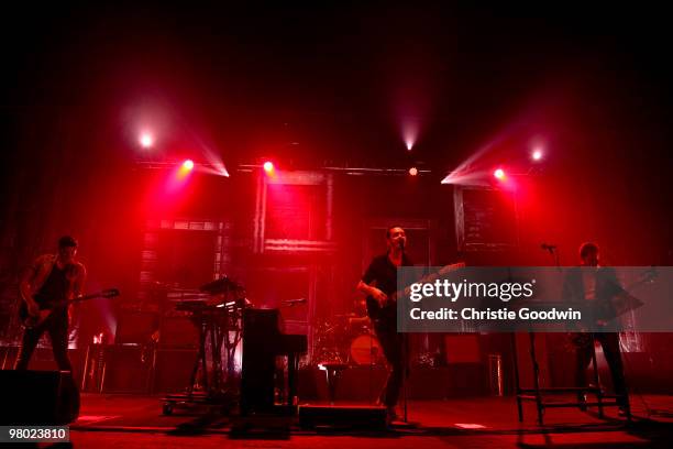 Chris Urbanowicz, Tom Smith and Russell Leetch of Editors perform at the Brixton Academy on March 24, 2010 in London, England.