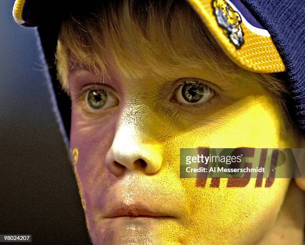 Fan watches play during the 2005 Chick-fil-A Peach Bowl at the Georgia Dome in Atlanta, Georgia on December 30, 2005. LSU defeated Miami 40-3.