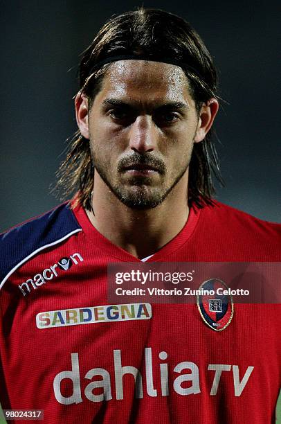 Joachin Larrivey of Atalanta BC competes for the ball with Daniele Conti of Cagliari Calcio during the Serie A match between Atalanta BC and Cagliari...