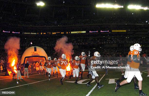 University of Miami players take the field before the 2005 Chick-fil-A Peach Bowl at the Georgia Dome in Atlanta, Georgia on December 30, 2005. LSU...