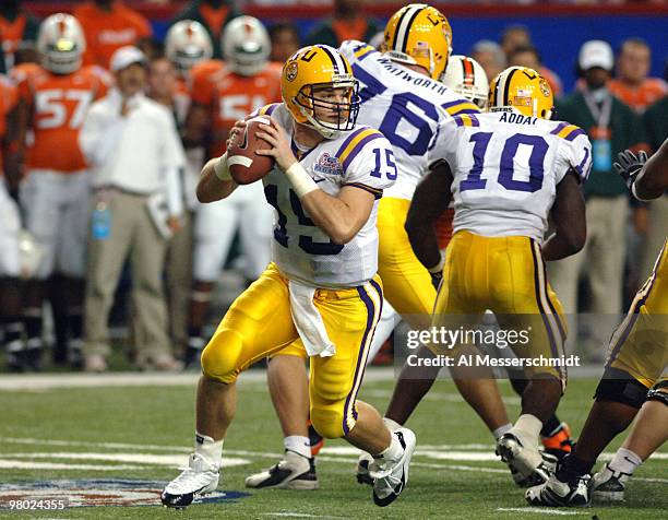 Quarterback Matt Flynn sets to pass against the University of Miami in the 2005 Chick-fil-A Peach Bowl at the Georgia Dome in Atlanta, Georgia on...