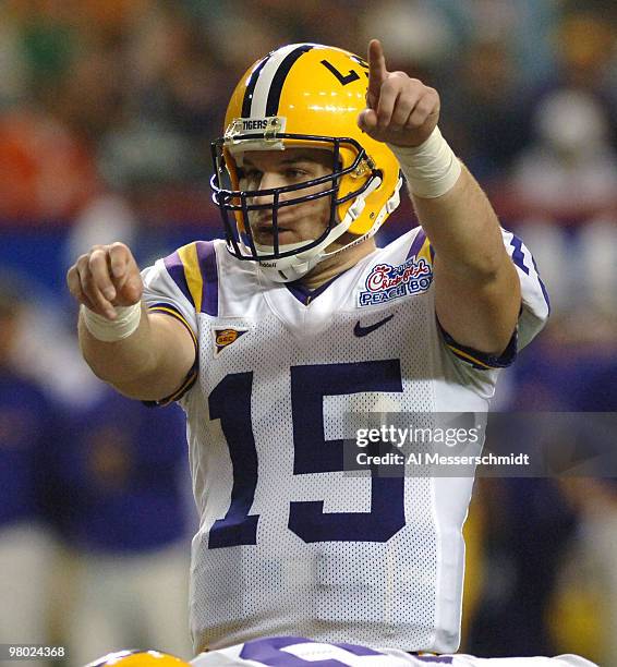 Quarterback Matt Flynn calls a play against the University of Miami in the 2005 Chick-fil-A Peach Bowl at the Georgia Dome in Atlanta, Georgia on...