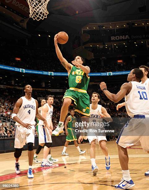 Deron Williams of the Utah Jazz gets a clear look at the net after crossing over Jose Calderon of the Toronto Raptors during a game on March 24, 2010...