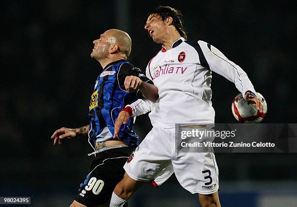 Simone Tiribocchi of Atalanta BC competes for the ball with Lorenzo Ariaudo of Cagliari Calcio during the Serie A match between Atalanta BC and...