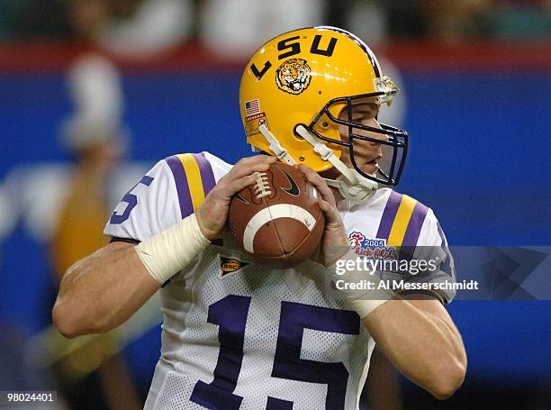 Quarterback Matt Flynn warms up before play against the University of Miami in the 2005 Chick-fil-A Peach Bowl at the Georgia Dome in Atlanta,...