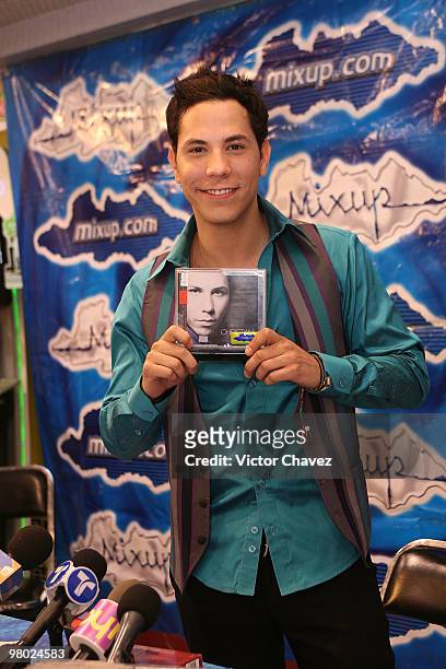 Singer Cristian Chavez signs copies of his new album ''Almas Transparentes'' at MixUp at Reforma 222 on March 23, 2010 in Mexico City, Mexico.