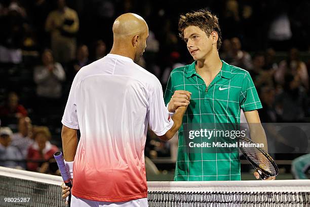 James Blake of the United States shakes hands with Filip Krajinovic of Serbia after defeating him in three sets during day two of the 2010 Sony...