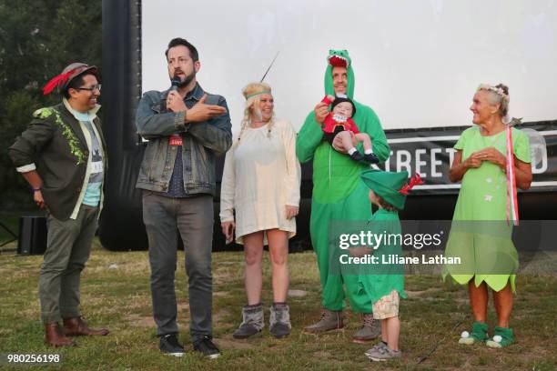 Event MC Kurt Long and families attend the Street Food Cinema Presents 65th Anniversary Screening Of Disney's "Peter Pan" at Griffith Park on June 2,...